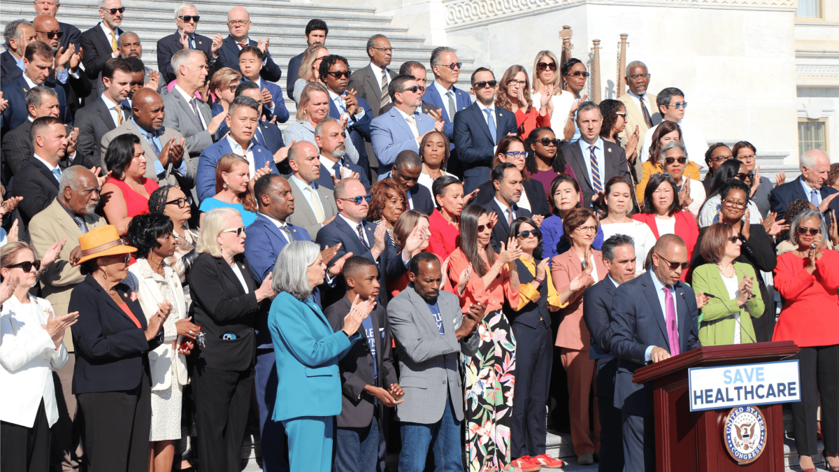 House members applauding on the House steps
