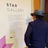 Rep. Adams looking at a museum exhibit