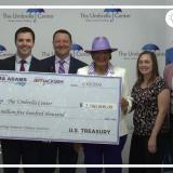 Reps. Adams and Jackson Present Check to Umbrella Center 